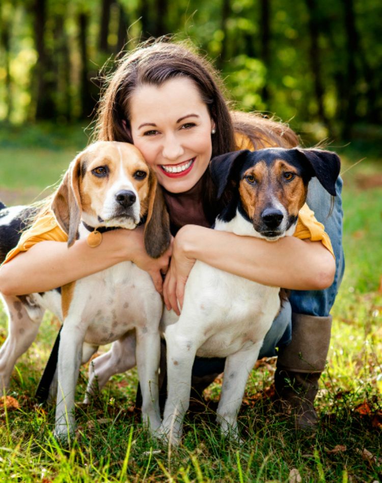 A person gently petting a dog, symbolizing the support an ESA provides and the privacy surrounding their documentation.